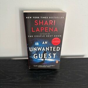 AN UNWANTED GUEST - SHARI LAPENA PAPERBACK BOOK